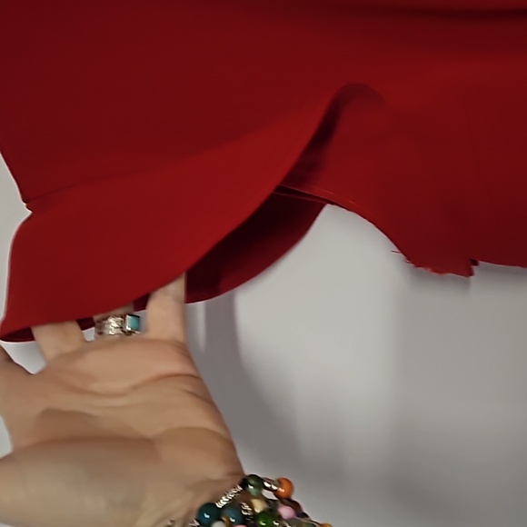 Vibrant red top with capped sleeves and asymmetrical bottom. Size xl. - Picture 2 of 5